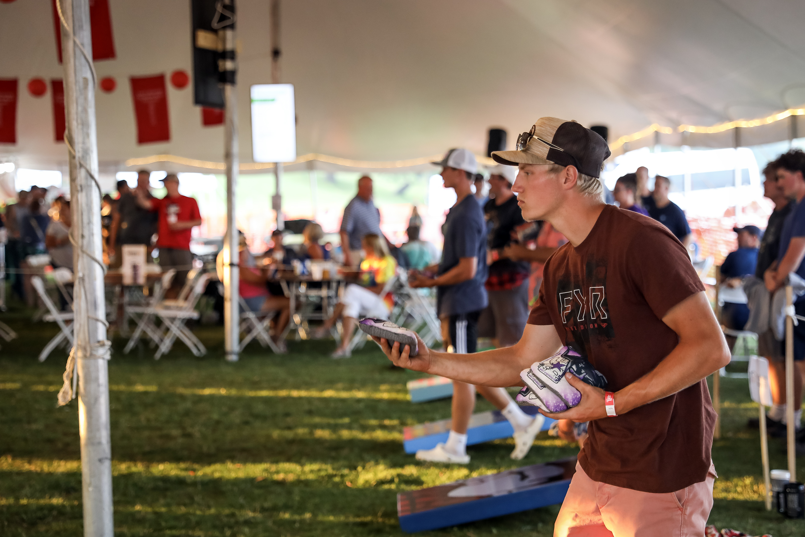 Teams face off in 12th Annual Cornhole Tournament during Dragon Boat Festival - Vimarsana News